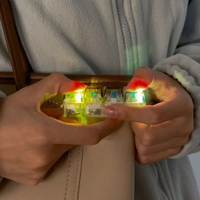 Illuminate Your Day with the Keyboard Toy Keychain: Mechanical Clicker with LED Lights for Stress Relief and Fun!